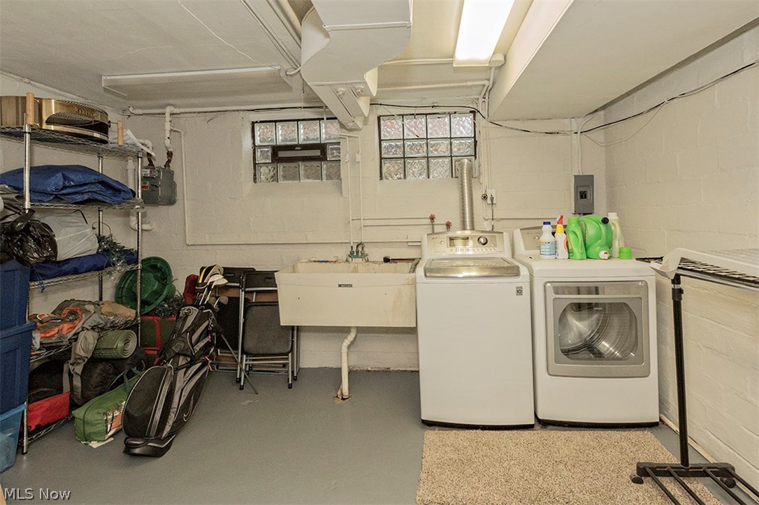 2539 Saybrook Road Cleveland, OH 44118 - Photo 32 of 35 The bright and clean laundry area with glass block windows