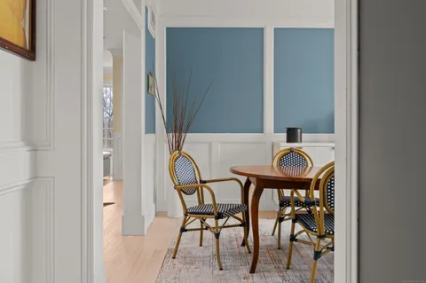 a table and chairs in a balcony