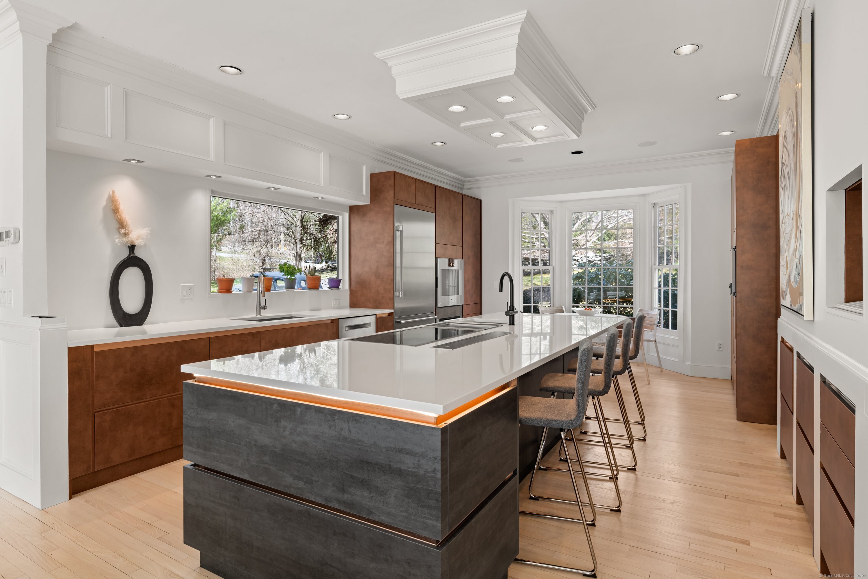 35 Branch Brook Road Wilton, CT 06897 - Photo 12 of 35 a living room with furniture a large window and wooden floor