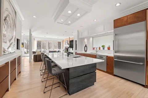 a kitchen with counter space and center island