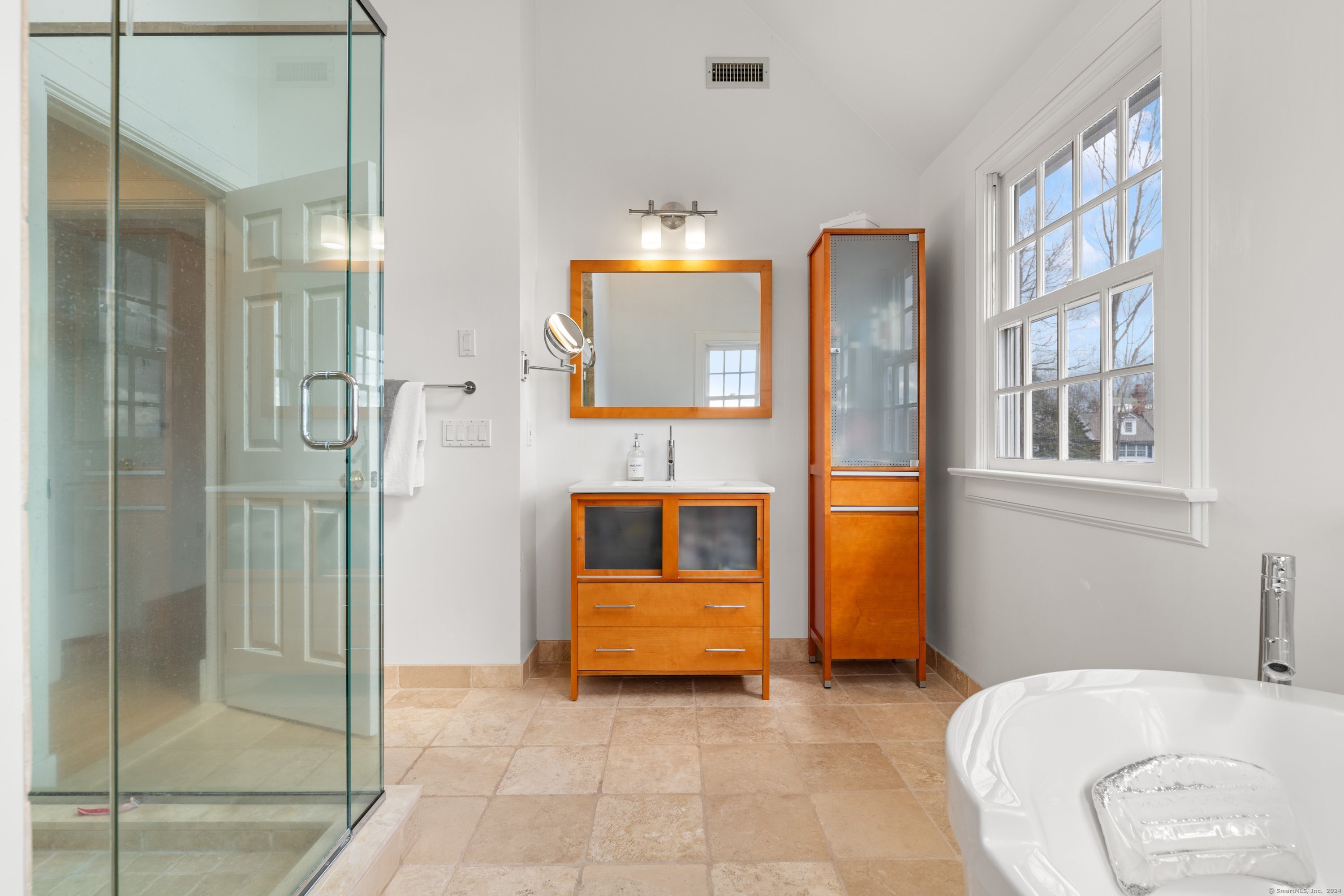 35 Branch Brook Road Wilton, CT 06897 - Photo 25 of 35 a en suite bathroom with a sink and a mirror
