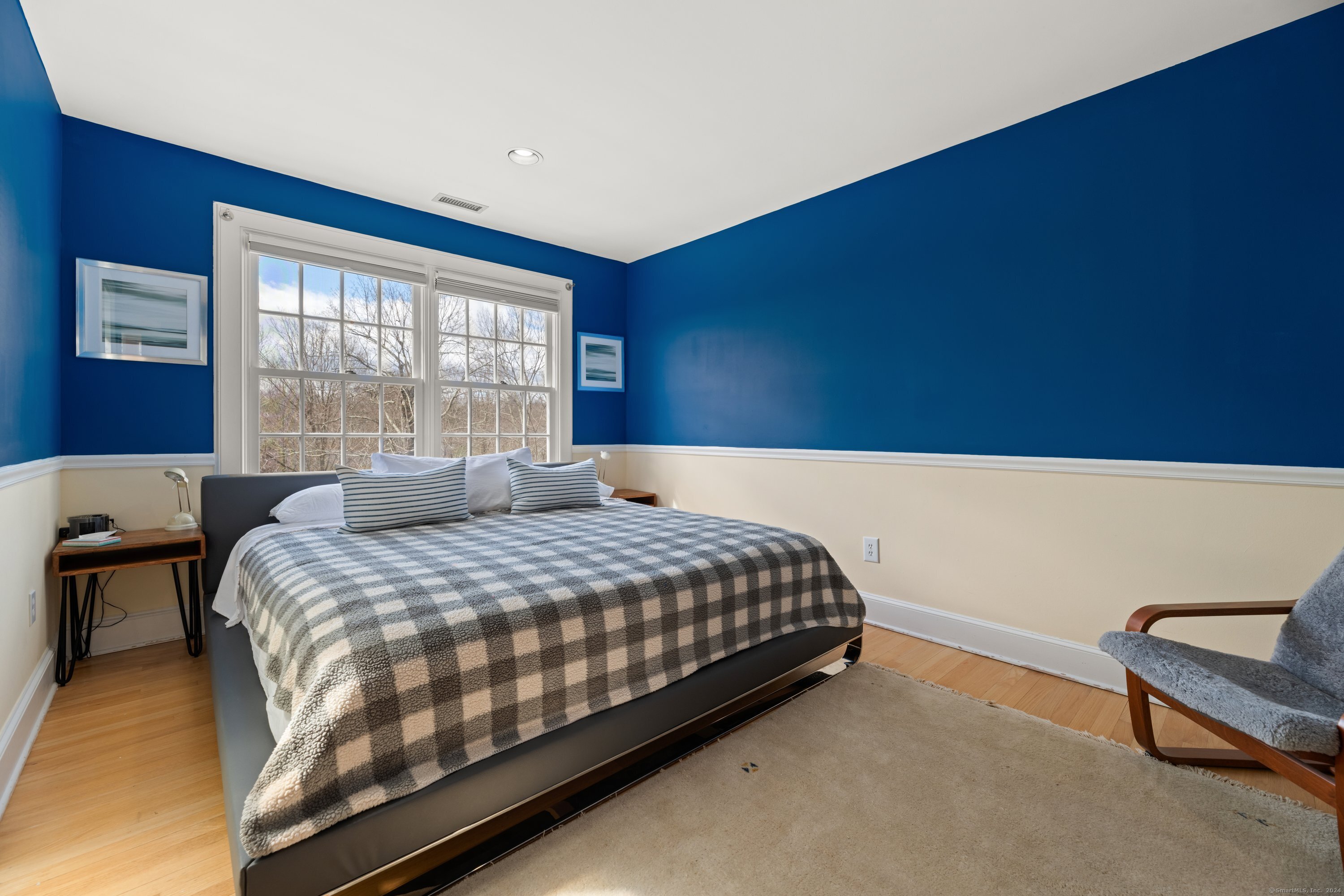 35 Branch Brook Road Wilton, CT 06897 - Photo 26 of 35 a bedroom with a bed chair and window