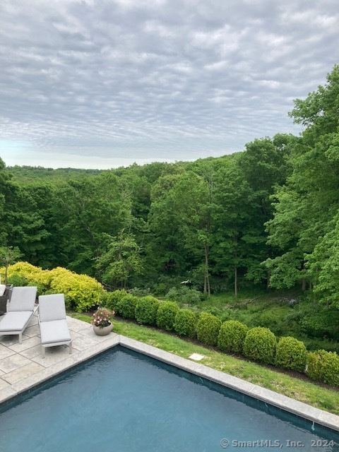 35 Branch Brook Road Wilton, CT 06897 - Photo 30 of 35 a view of a terrace with yard and mountain view in back