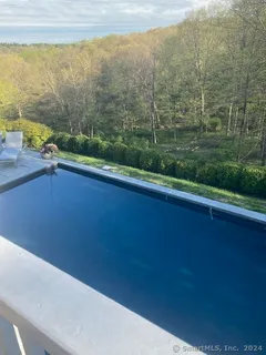 a view of a balcony with an outdoor space