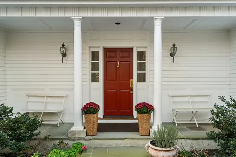 a front view of a house with patio