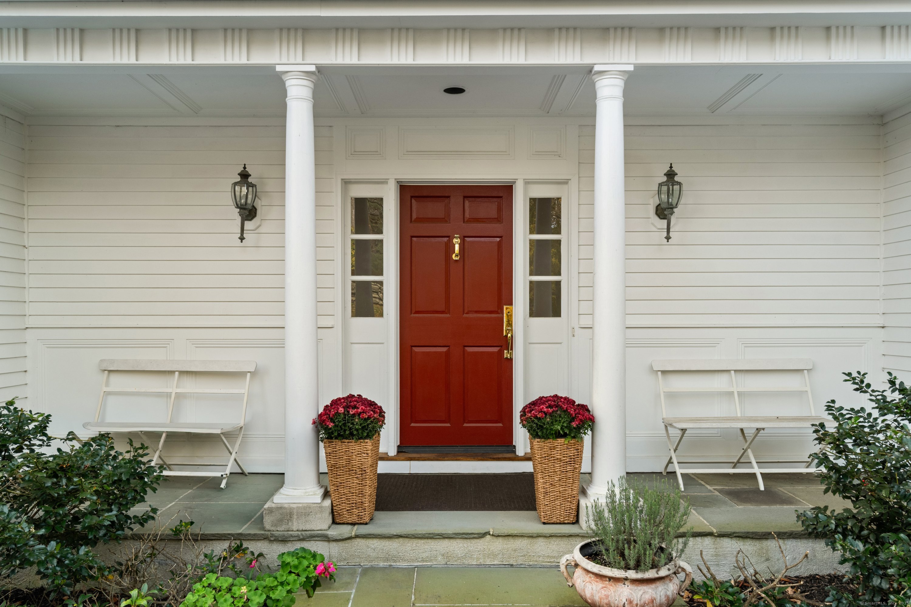 35 Branch Brook Road Wilton, CT 06897 - Photo 5 of 35 a front view of a house with patio