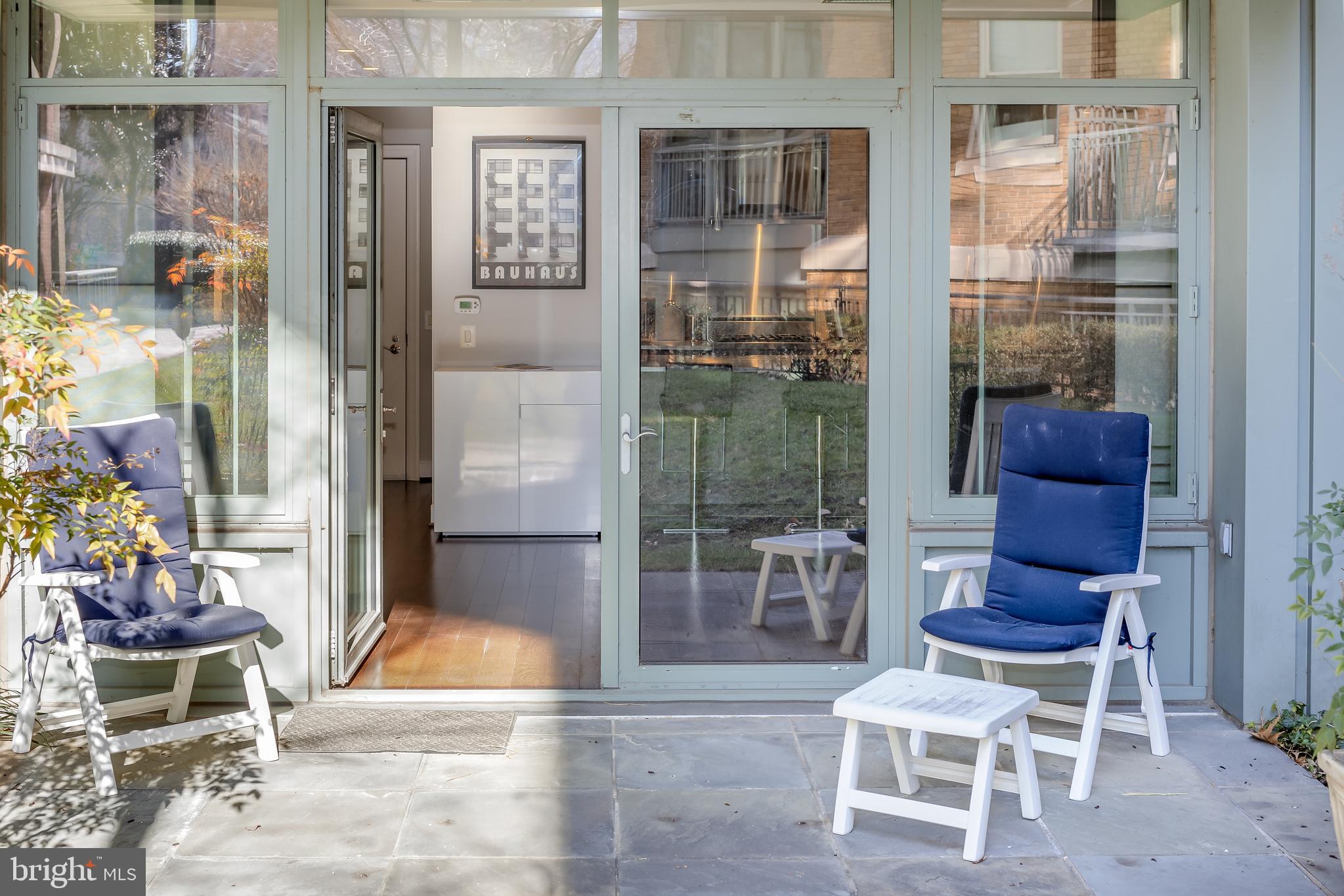 2425 L Street Northwest, Unit 211 Washington, DC 20037 - Photo 24 of 43 a room with a table and chairs