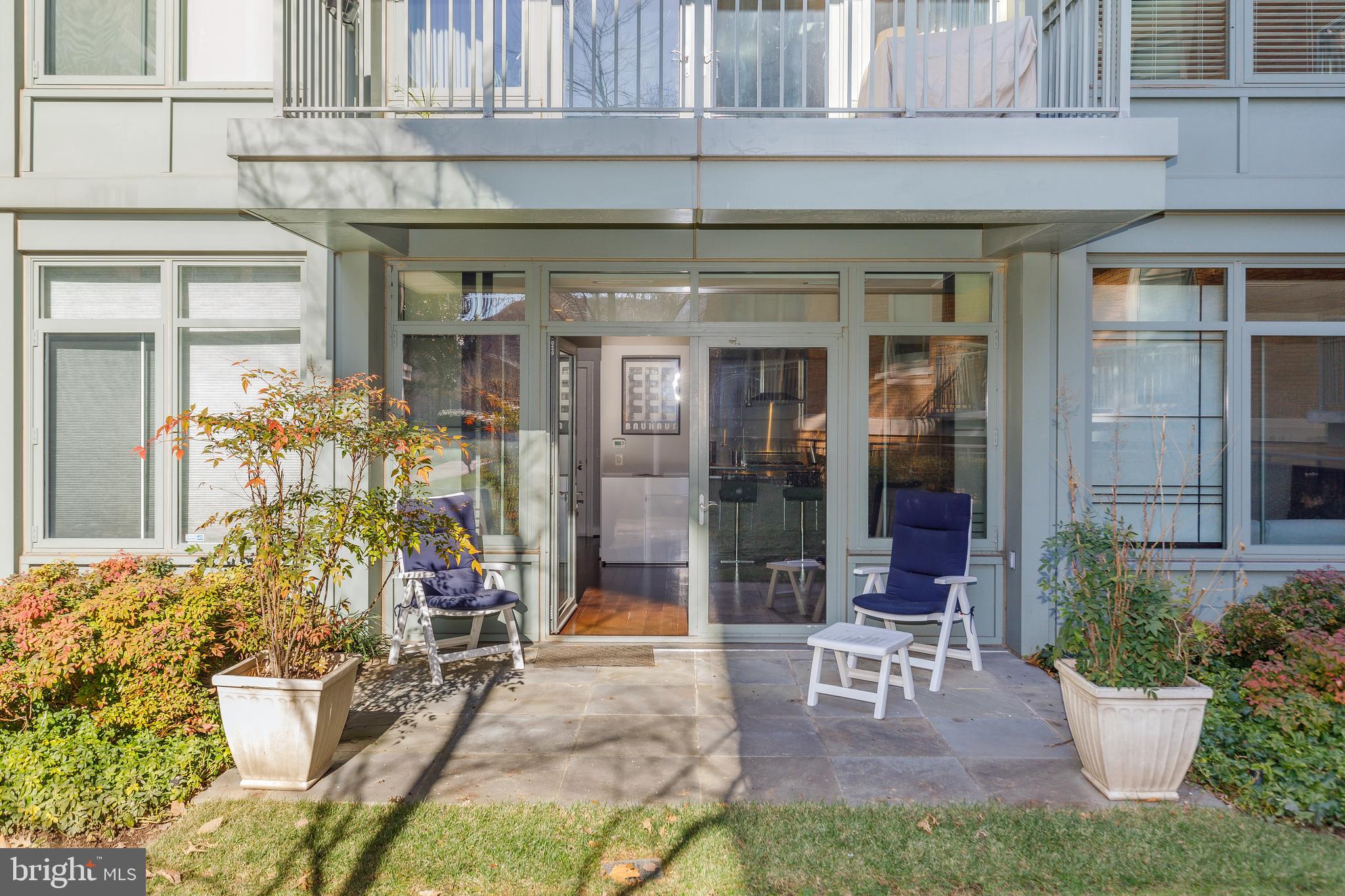 2425 L Street Northwest, Unit 211 Washington, DC 20037 - Photo 26 of 43 a view of house with outdoor seating area