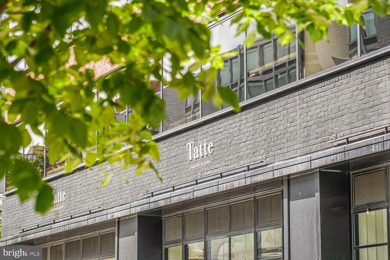 2425 L Street Northwest, Unit 211 Washington, DC 20037 - Photo 39 of 43 a house view with a tree