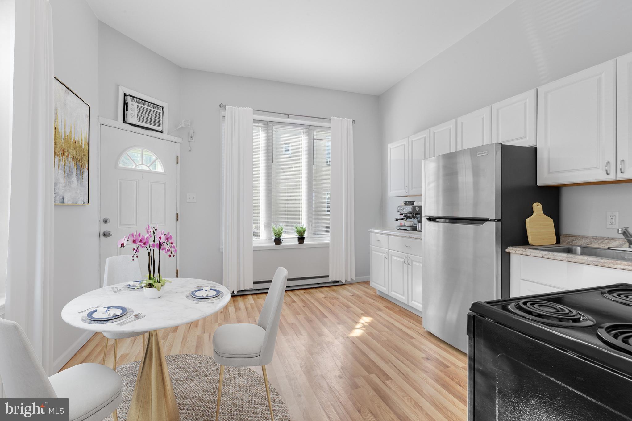 2641 East Madison Street Philadelphia, PA 19134 - Photo 3 of 17 1st Floor Unit: Eat-in Kitchen (Virtually Staged)