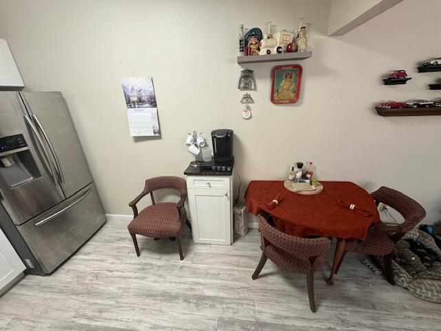 1465 Malibu Circle Northeast, Unit 101 Palm Bay, FL 32905 - Photo 14 of 25 a view of a workspace with furniture