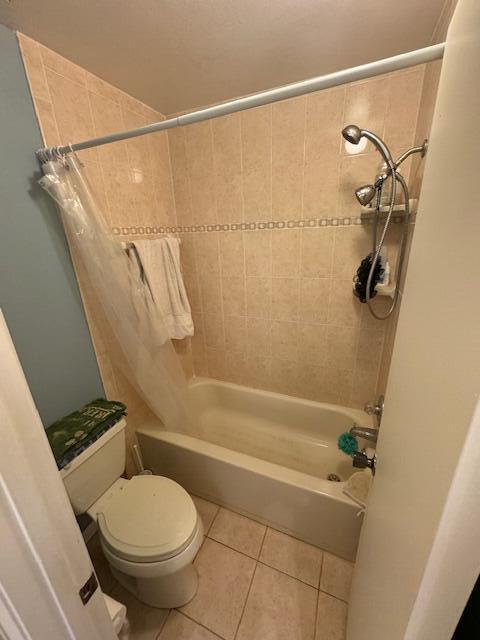 1465 Malibu Circle Northeast, Unit 101 Palm Bay, FL 32905 - Photo 18 of 25 a bathroom with a toilet and a shower