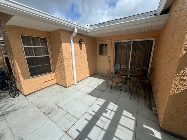 1465 Malibu Circle Northeast, Unit 101 Palm Bay, FL 32905 - Photo 7 of 25 a view of front door