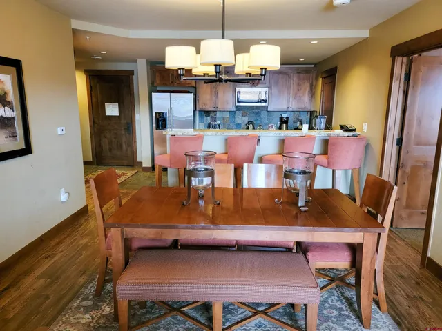 a view of a dining room with furniture