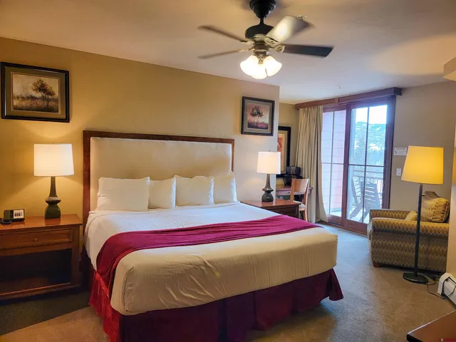 a bedroom with a bed and furniture