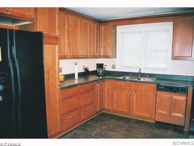Kitchen - Updated Kitchen.  Fridge coveys with hom