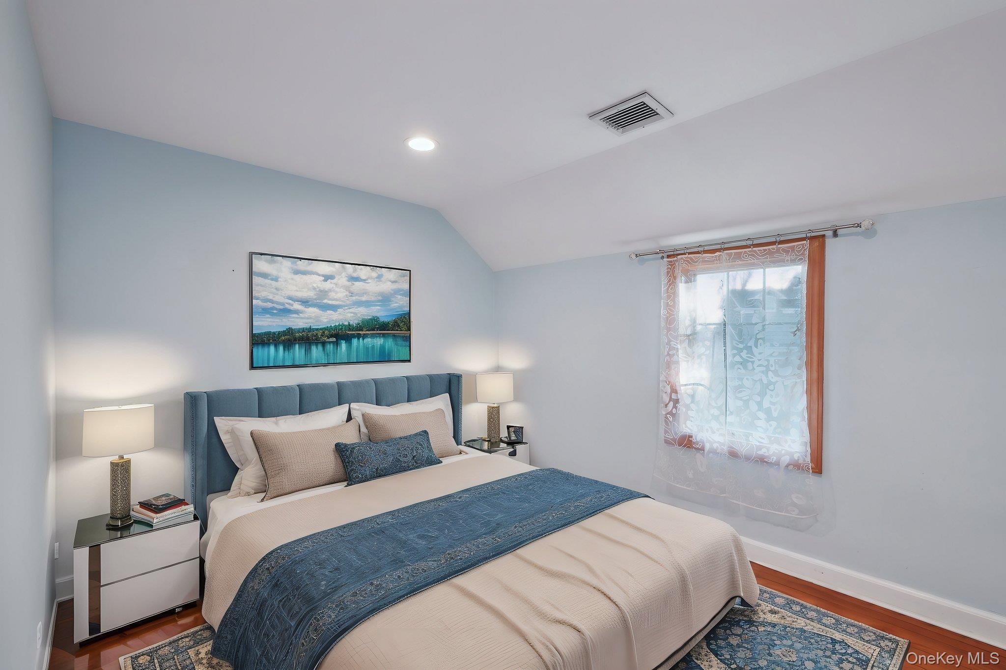 1250 Harbor Road Hewlett, NY 11557 - Photo 14 of 18 a bedroom with bed and window