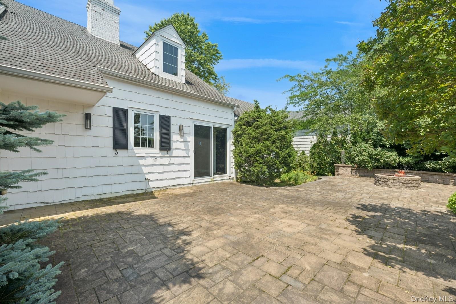 1250 Harbor Road Hewlett, NY 11557 - Photo 16 of 18 a view of a house with a outdoor space