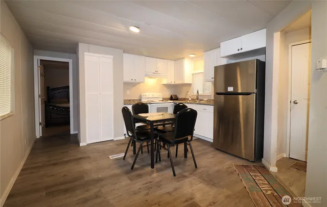 a view of a dining room with furniture