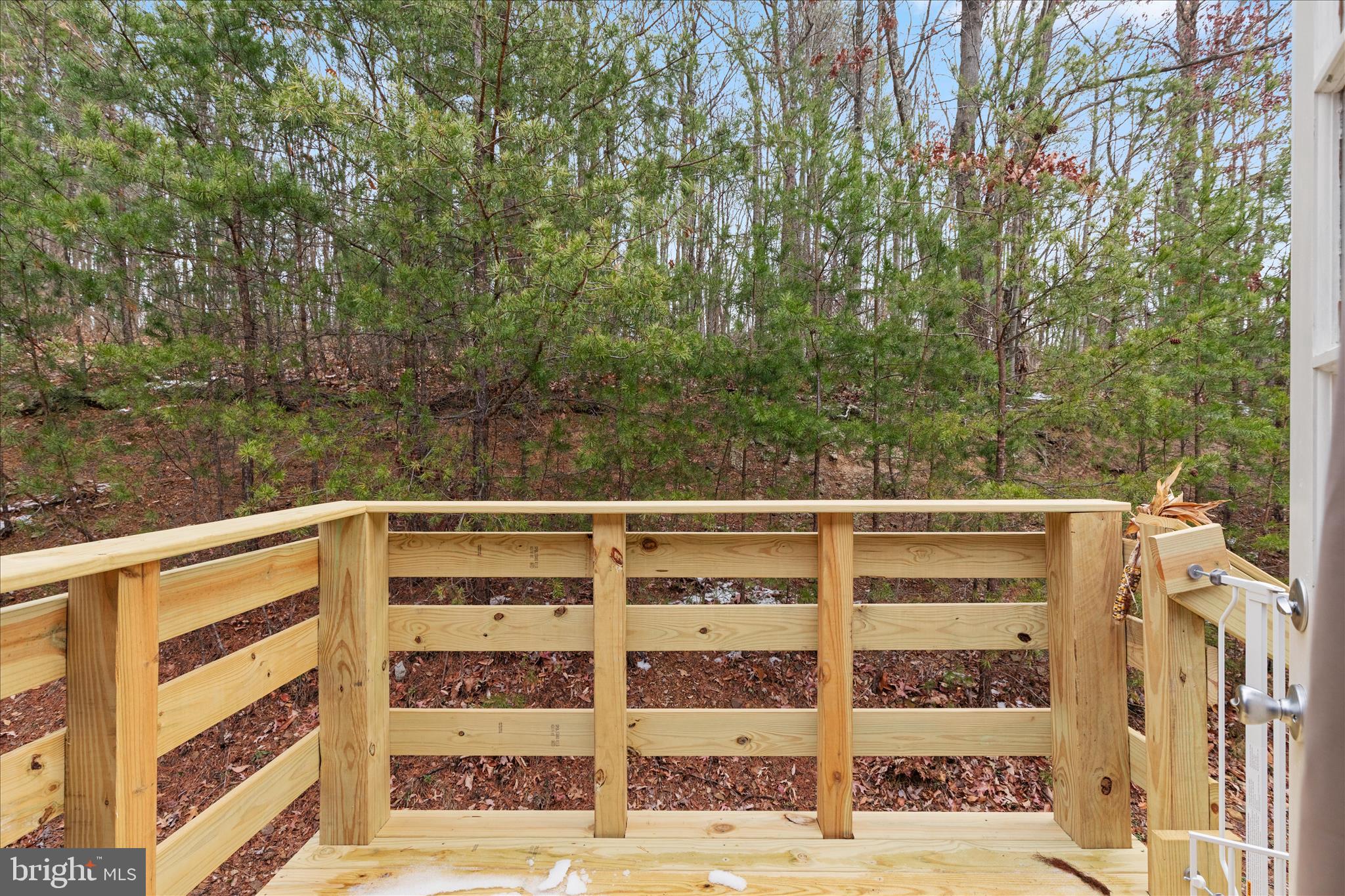 985 Waugh Road Berkeley Springs, WV 25411 - Photo 15 of 22 a view of a building from a balcony
