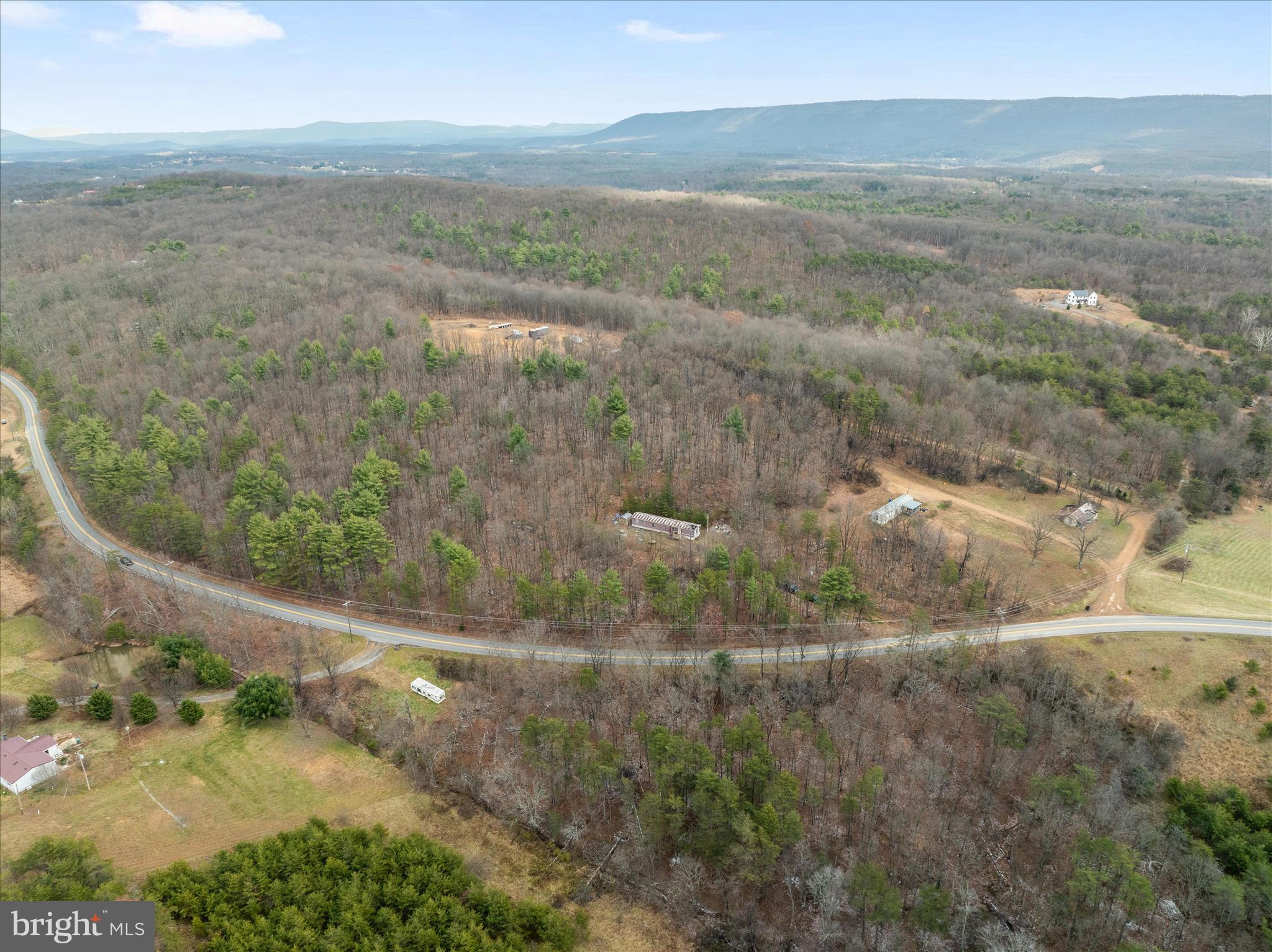 985 Waugh Road Berkeley Springs, WV 25411 - Photo 19 of 22 a view of a lake in middle of the town