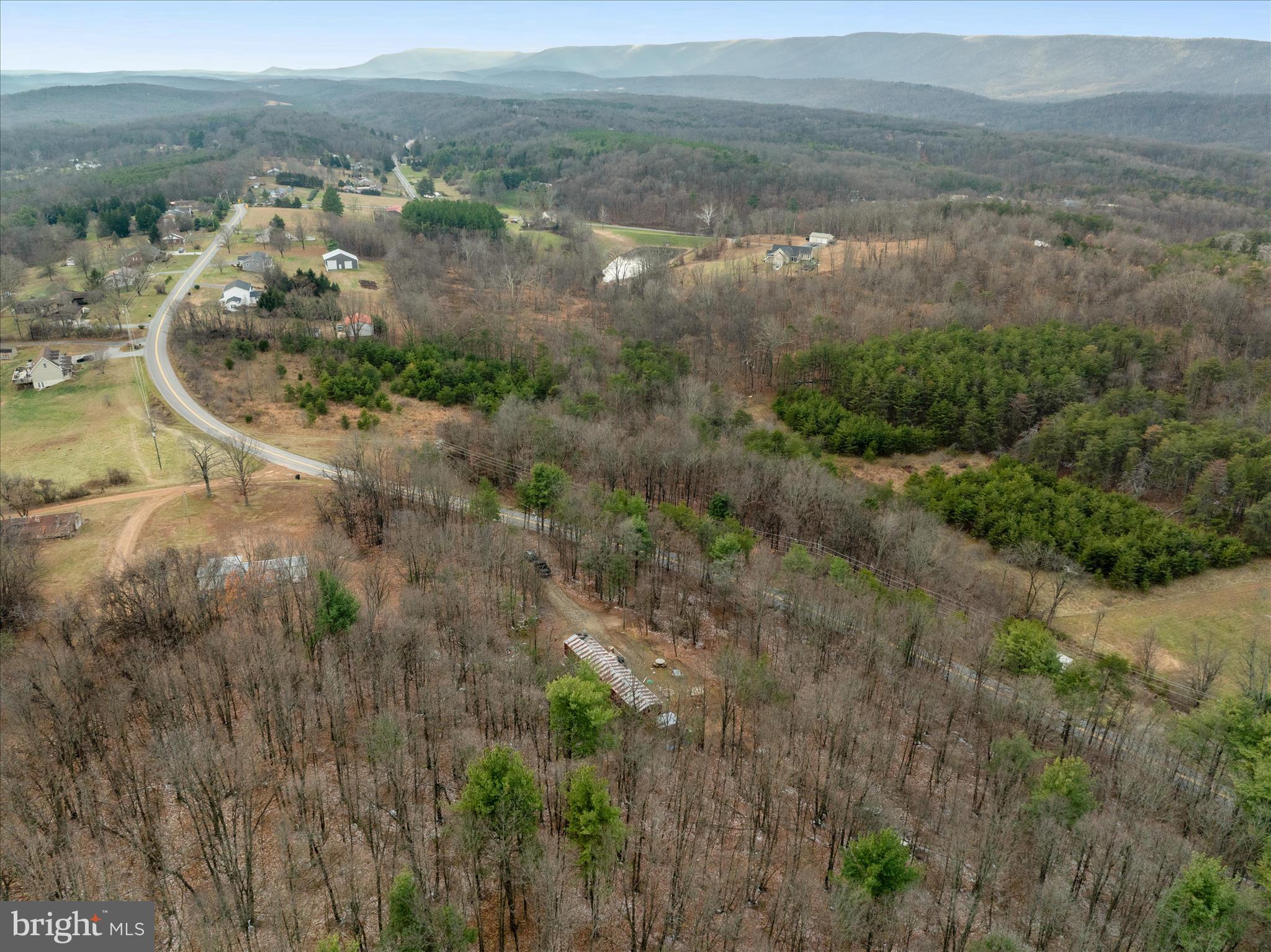 985 Waugh Road Berkeley Springs, WV 25411 - Photo 21 of 22 a view of lake with green space