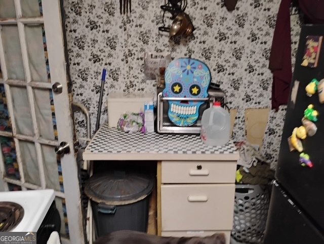 4124 Worsham Avenue Macon, GA 31206 - Photo 4 of 5 a living room with furniture and a fireplace