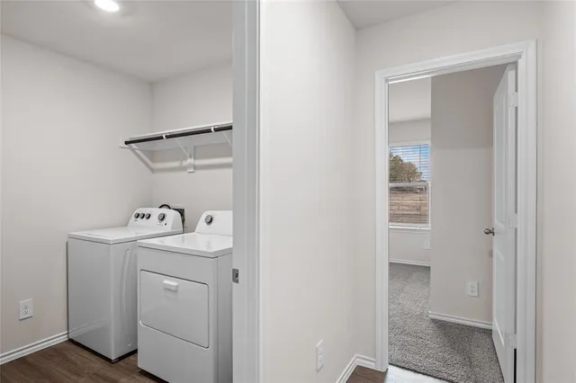 a bathroom with a sink and washing machine
