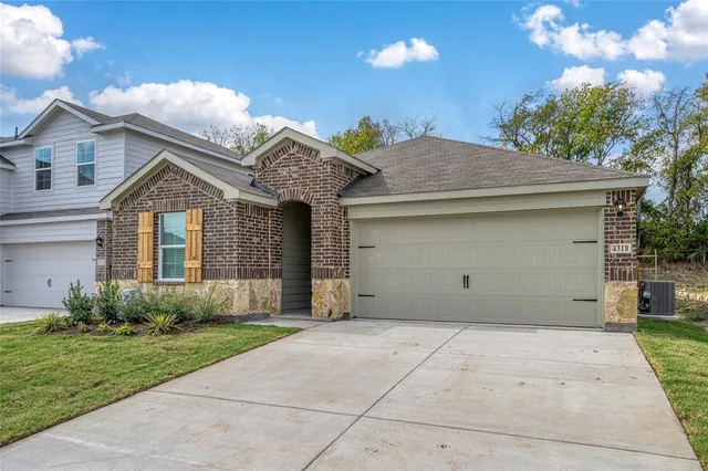 a front view of house with yard