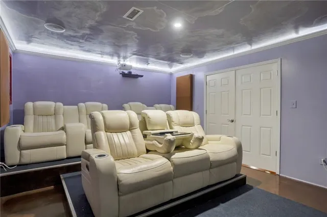 a room with furniture and a flat screen tv