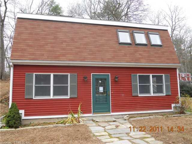 688 5 Mile River Road Putnam, CT 06260 - Photo 1 of 1 a front view of a house