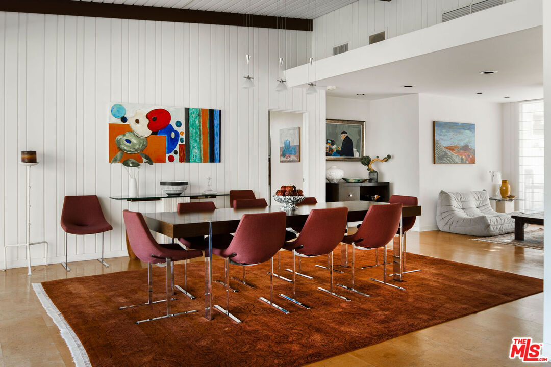 1023 Maybrook Drive Beverly Hills, CA 90210 - Photo 12 of 17 a living room with furniture kitchen view and a table