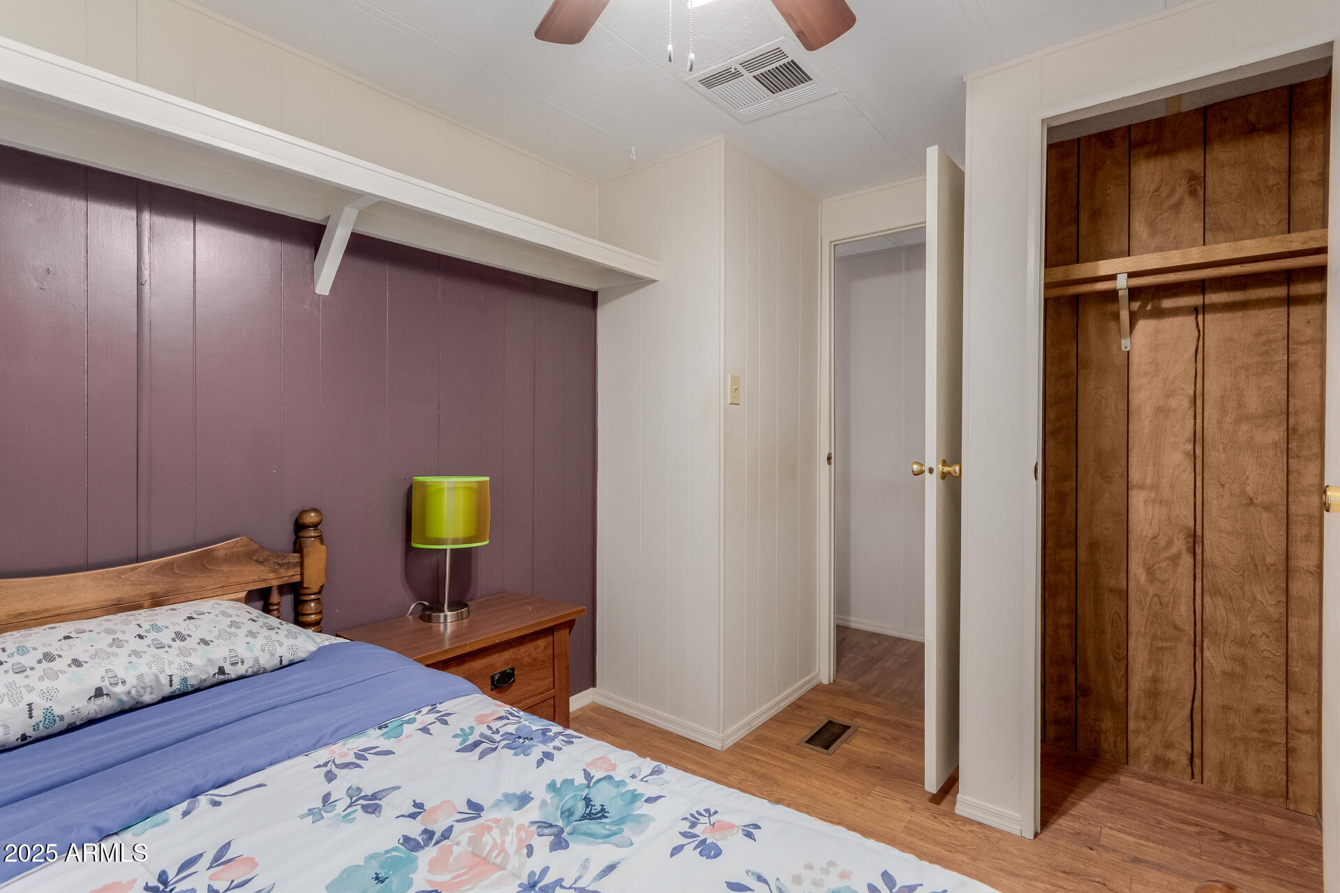 1050 East Broadway Avenue, Unit 84 Apache Junction, AZ 85119 - Photo 12 of 34 a bedroom with a bed and a dresser