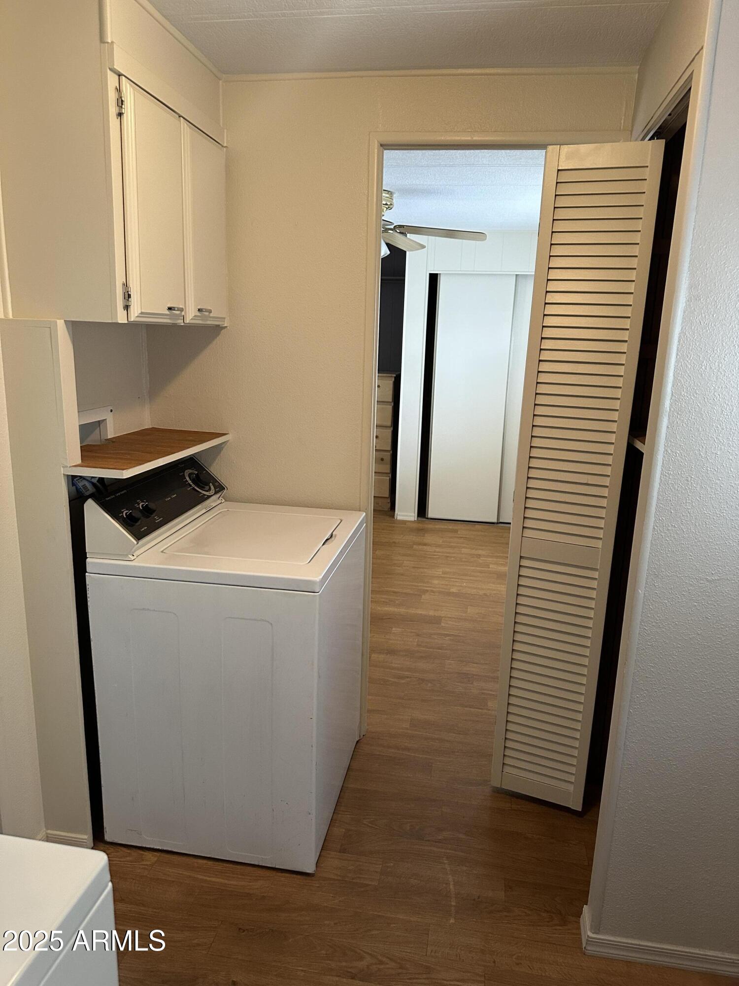 1050 East Broadway Avenue, Unit 84 Apache Junction, AZ 85119 - Photo 18 of 34 a utility room with dryer and washer