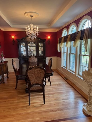 5 Gableview Lane Southwick, MA 01077 - Photo 12 of 31 a view of a dining room with furniture a chandelier and wooden floor