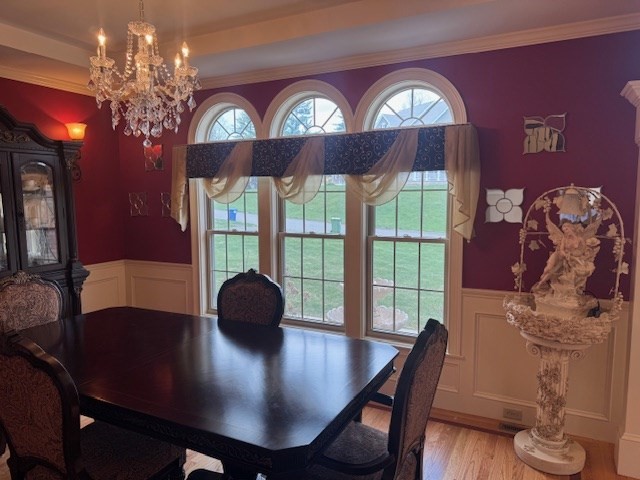 5 Gableview Lane Southwick, MA 01077 - Photo 18 of 31 a view of a dining room with furniture a chandelier and a large window