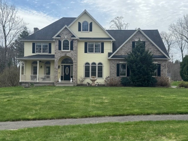 5 Gableview Lane Southwick, MA 01077 - Photo 28 of 31 a front view of a house with a garden