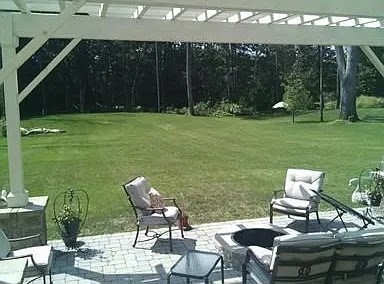 5 Gableview Lane Southwick, MA 01077 - Photo 6 of 31 a view of a lake with furniture