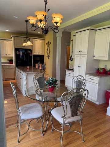 5 Gableview Lane Southwick, MA 01077 - Photo 10 of 31 a dining room filled chandelier and wooden floor