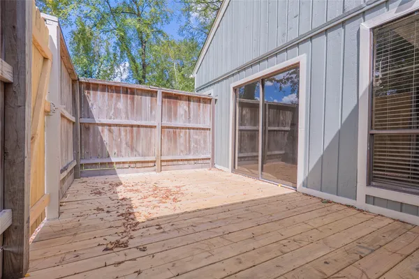 a view of wooden floor with a outdoor space