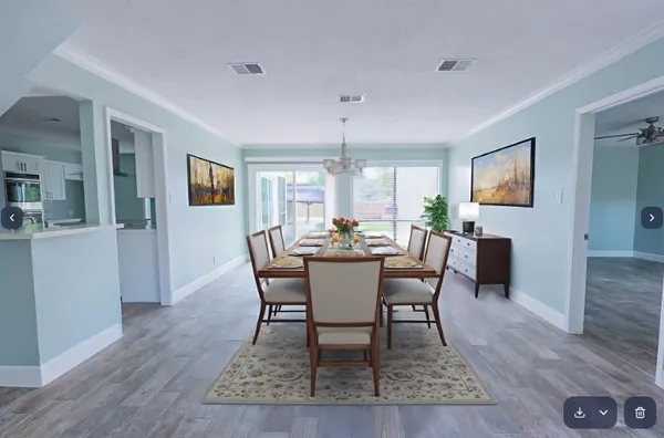 a dining room with furniture a window and wooden floor