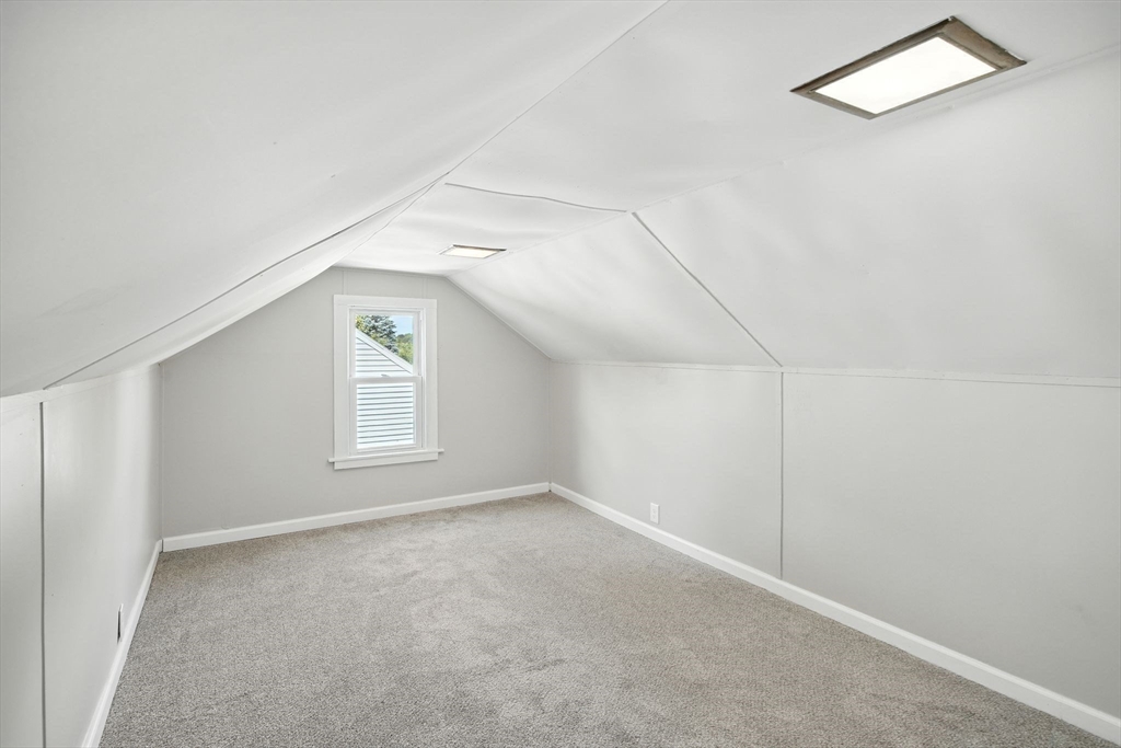 104 Grandview Street Springfield, MA 01118 - Photo 19 of 30 an empty room with windows and closet