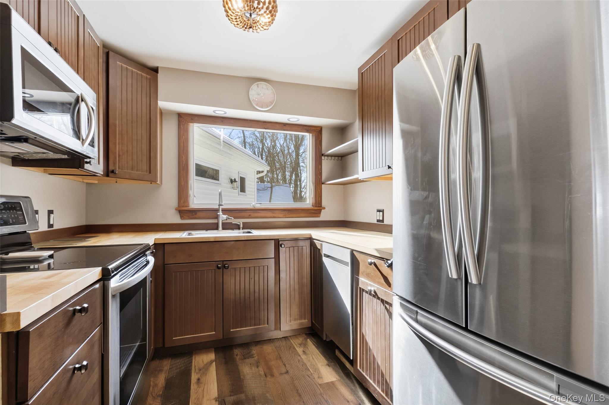 19 Curry Road Mahopac, NY 10541 - Photo 13 of 36 a kitchen with stainless steel appliances granite countertop a refrigerator and a sink
