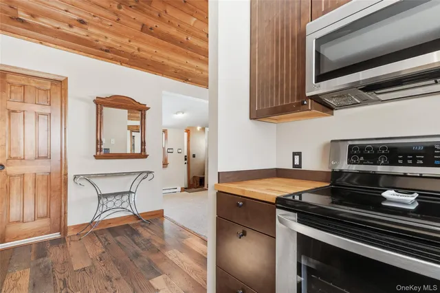 a kitchen with a stove and a microwave