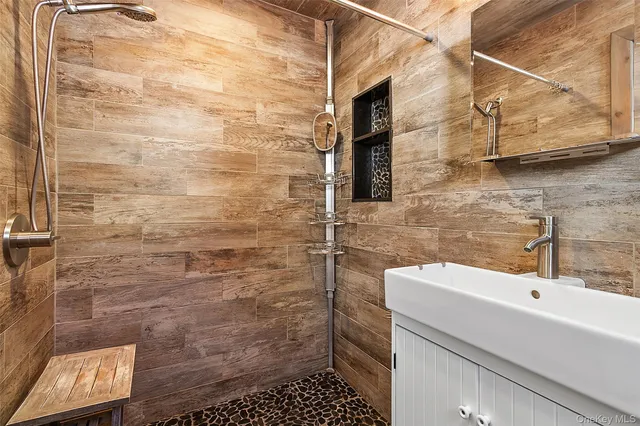 a bathroom with a sink and a shower