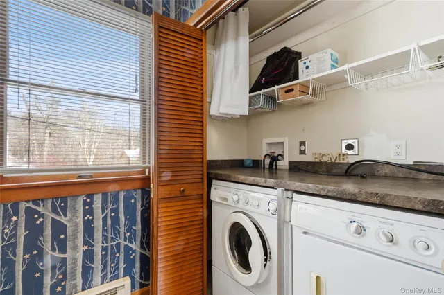 a kitchen with stainless steel appliances granite countertop a sink and a stove
