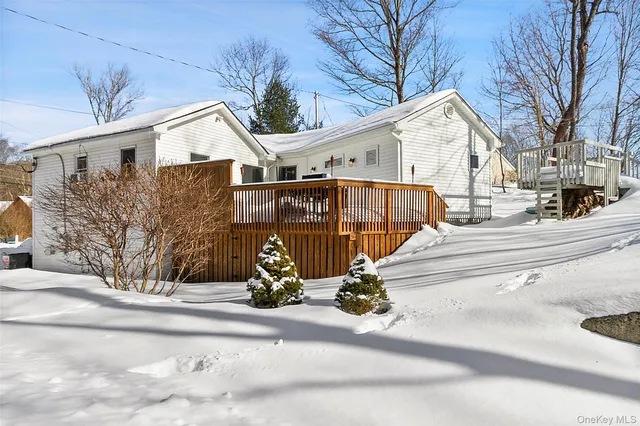a view of a house with a street