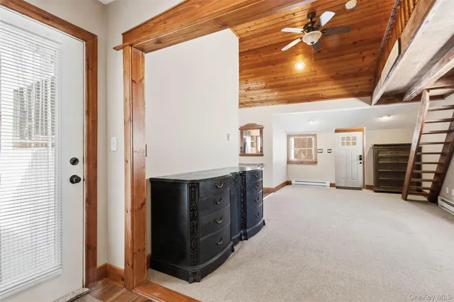 a view of a hallway with closet