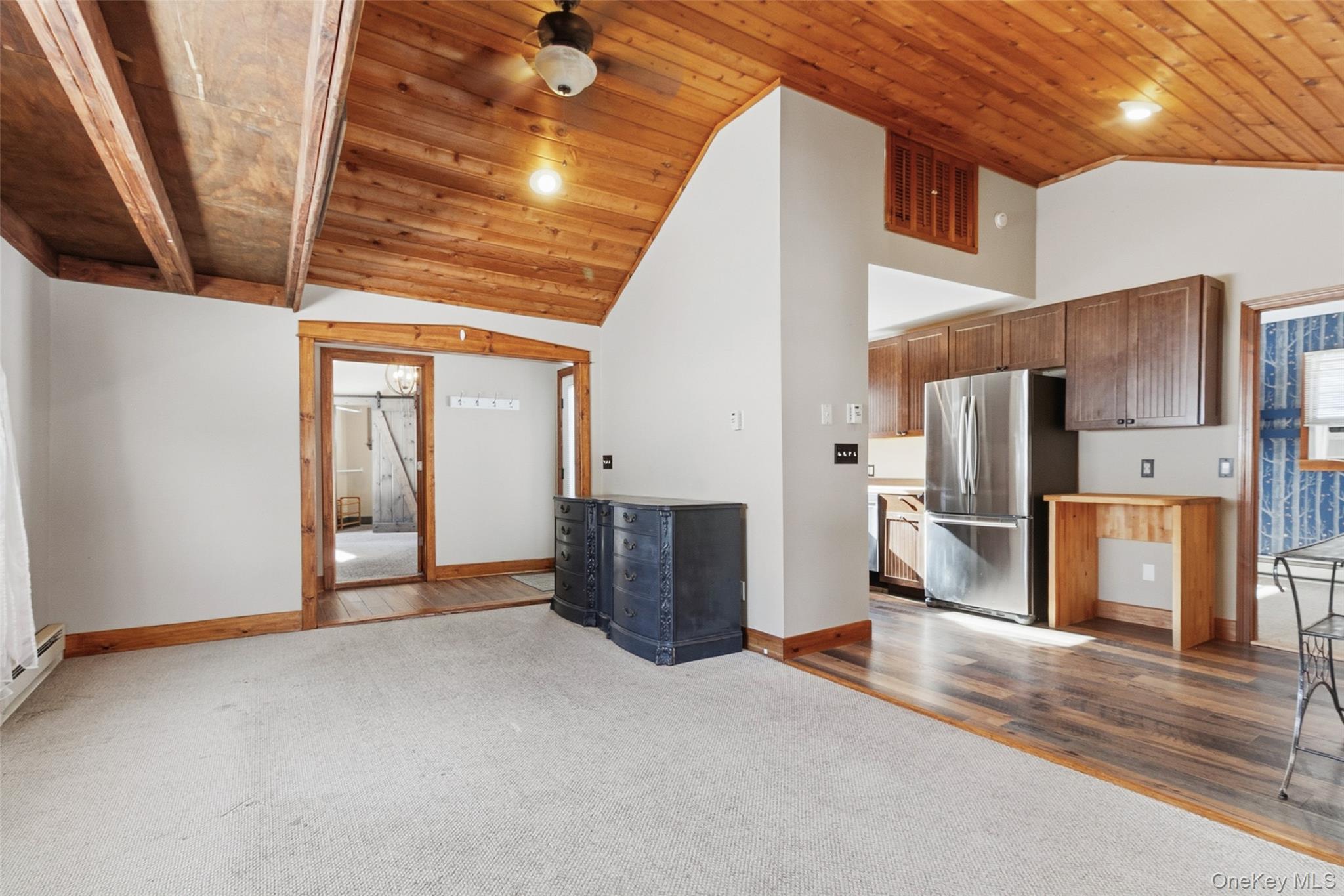 19 Curry Road Mahopac, NY 10541 - Photo 4 of 36 a view of a hallway with wooden cabinet