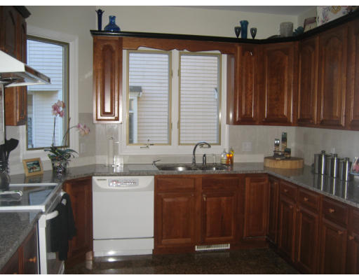 32 Tanglewood Road, Unit 32 Newton, MA 02459 - Photo 3 of 3 a kitchen with a sink and cabinets